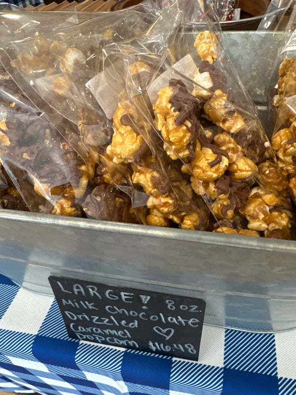 LARGE MILK CHOCOLATE DRIZZLED CARAMEL POPCORN 8 oz.
